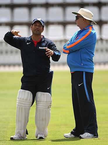 Sachin Tendulkar talks to Duncan Fletcher during a practice session at Lord's cricket ground