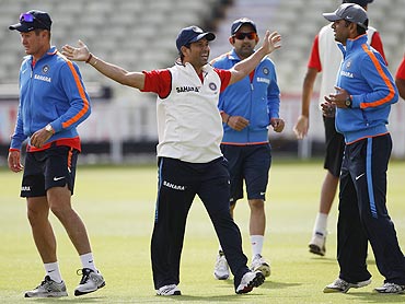 India's Sachin Tendulkar shares a light moment with teammates during a training session at Edgbaston