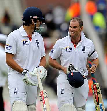 Andrew Strauss and Alastair Cook walk back to the pavillion after the days play