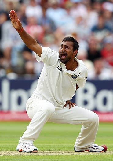 Praveen Kumar appeals successfully for the wicket of Kevin Pietersen