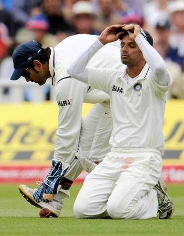 Rahul Dravid reacts after missing a catch