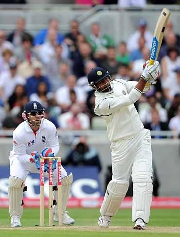 Praveen Kumar hits a six off Graeme Swann