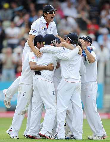 James Anderson celebrates after picking the wicket of VVS Laxman