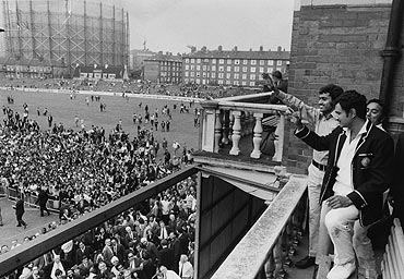 India skipper Ajit Wadekar and teammate B S Chandraserhar wave to cheering crowds at The Oval after India won the Test series against England in August 1971