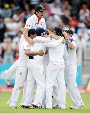 The England cricket team celebrate their victory against India in the third Test at Birmingham