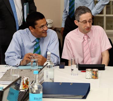 ICC Chief match referee Ranjan Madugalle (left) with cricket statistician David Kendix