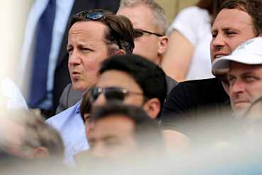 Britain's PM Cameron watches the action on Day 2