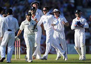 Sachin Tendulkar walks back after being dismissed