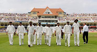 Indian players leave the field
