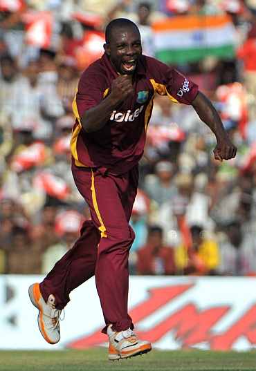 Anthony Martins celebrates after picking the wicket of Gautam Gambhir