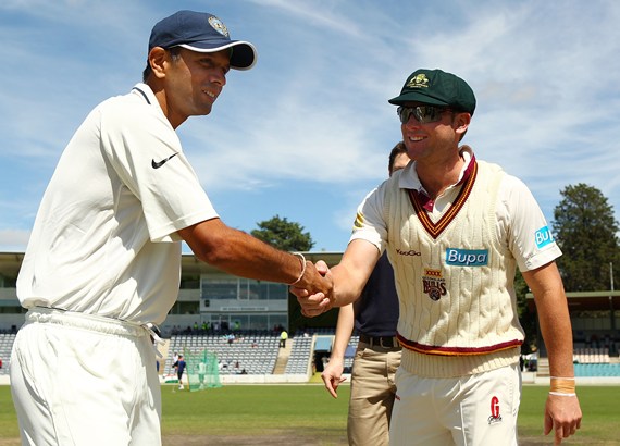 Rahul Dravid and Ryan Broad of the Cricket Australia Chairman's XI shake hands after the coin toss.