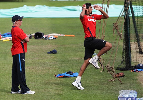 Coach Duncan Fletcher watches Ishant bowl in the nets