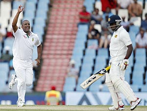 South Africa's Vernon Philander (left) celebrates the dismissal of Sri Lanka's Rangana Herath on Saturday