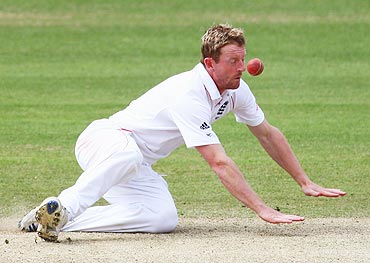 Paul Collingwood of England is hit by the ball