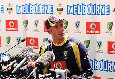 Mike Hussey speaks during a press conference