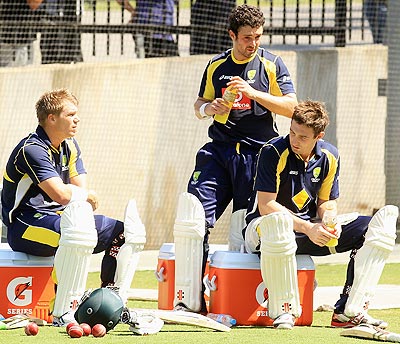 From left: David Warner, Ed Cowan and Shaun Marsh look on during an Australian Test team training session at Melbourne Cricket Ground