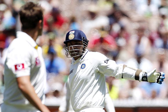 Virender Sehwag watches as James Pattinson appeals