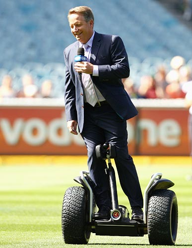 Ian Healy rides the Segway scooter