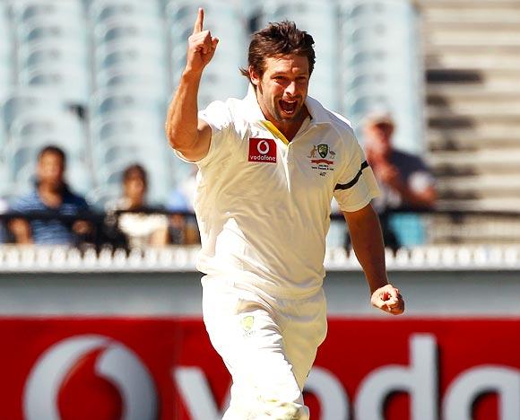 Ben Hilfenhaus celebrates after taking the wicket of Rahul Dravid