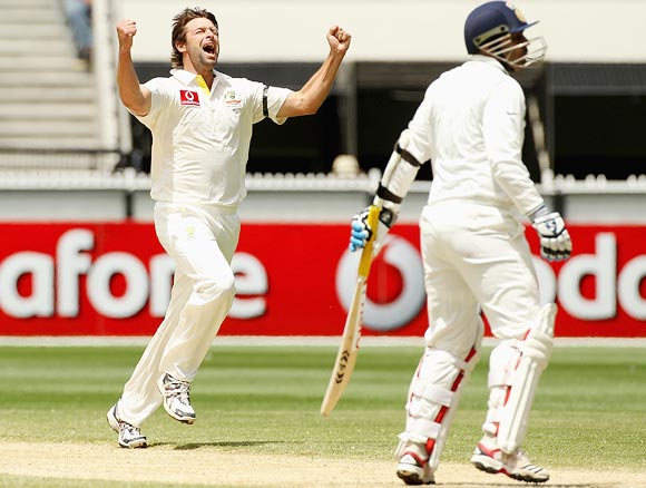 Ben Hilfenhaus celebrates after taking the wicket of Virender Sehwag