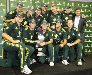 The Australian One-Day team pose with the trophy after their win over England in Perth on Sunday