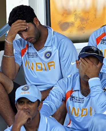 Indian players react after losing a match at World Cup 2007