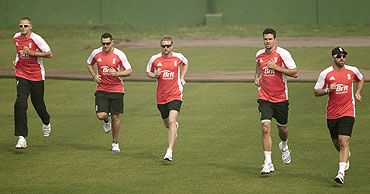 England's Stuart Broad, (left to right) Tim Bresnan, Paul Collingwood and Kevin Pietersen take part in a cricket training session on Monday
