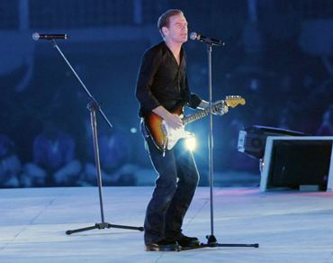 Bryan Adams performs at the opening ceremony