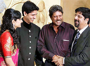 Kapil Dev attends Srikkanth's son's wedding reception.