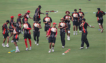 The Canadian squad warm up during the nets session on Saturday