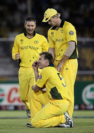 Brett Lee is congratulated by teammates after dismissing Charles Coventry