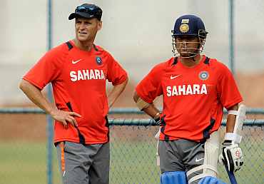 India's Sachin Tendulkar and coach Gary Kirsten during a practice session in Bangalore