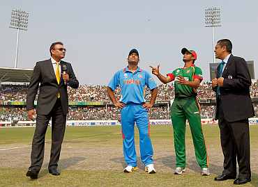MS Dhoni during the toss in Dhaka
