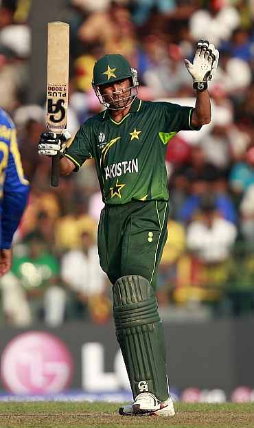 Younis Khan reacts after completing his half-century