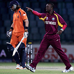 Kemar Roach celebrates after the dismissal of Bas Zuiderent