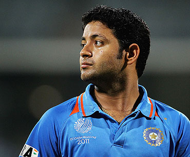 Piyush Chawla wears a dejected look after a below par performance against England