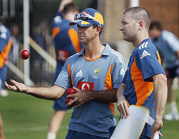 Australia's Michael Clarke and Ricky Ponting chat during a team practice session in Sydney