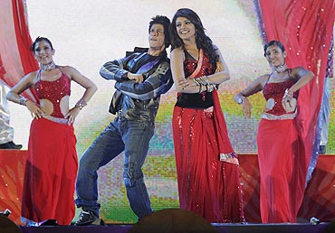 Bollywood actors Shah Rukh Khan and Priyanka Chopra perform at a show after the Twenty20 match between South Africa and India in Durban, on Sunday