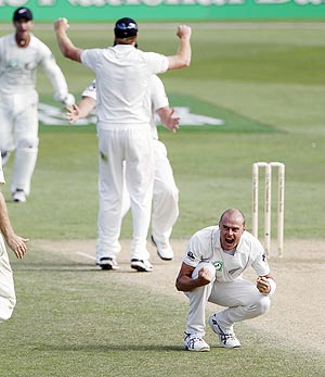 New Zealand's Chris Martin celebrates after dismissing Pakistan's Misbah-ul-Haq 