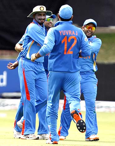Indian players celebrate the dismissal of South African captain Graeme Smith on Friday