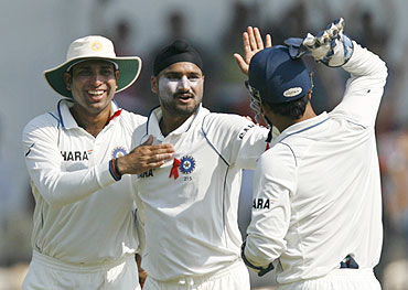 Harbhajan celebrates with teammates