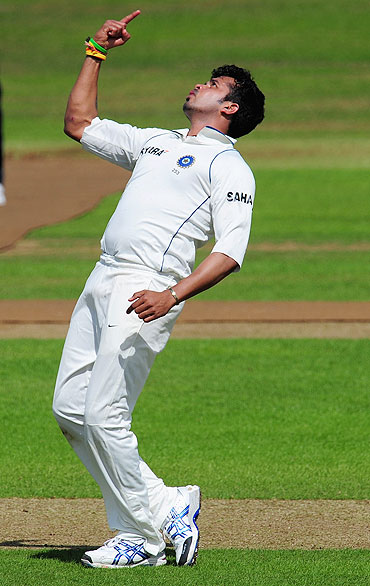 India bowler S Sreesanth celebrates the wicket of Arul Suppiah