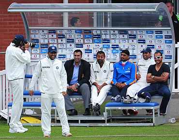 India bowler Ishant Sharma photographs the Indian bench during day two of the tour match