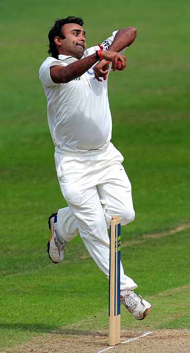 Amit Mishra bowls during his practice match against Somerset