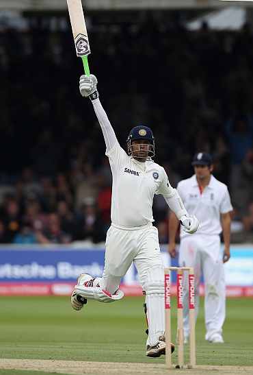 Rahul Dravid celebrates after scoring his century against England