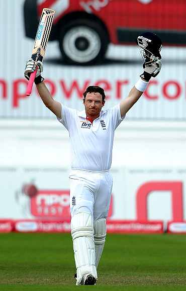Ian Bell celebrates after completing his century against India