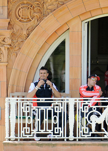 England's Kevin Pietersen (left) and Andrew Strauss sit on the dressing room balcony after both were dismissed during the second Test on Friday