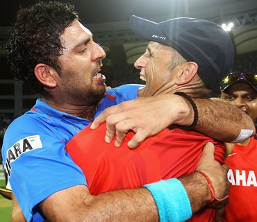 Yuvraj celebrates with former coach Gary Kirsten after the World Cup final
