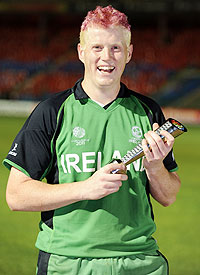 Ireland's Kevin O'Brien smiles while holding the man of the match trophy