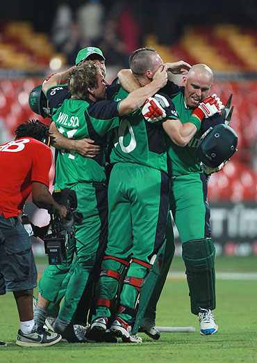 Ireland players celebrate after winning their match against England
